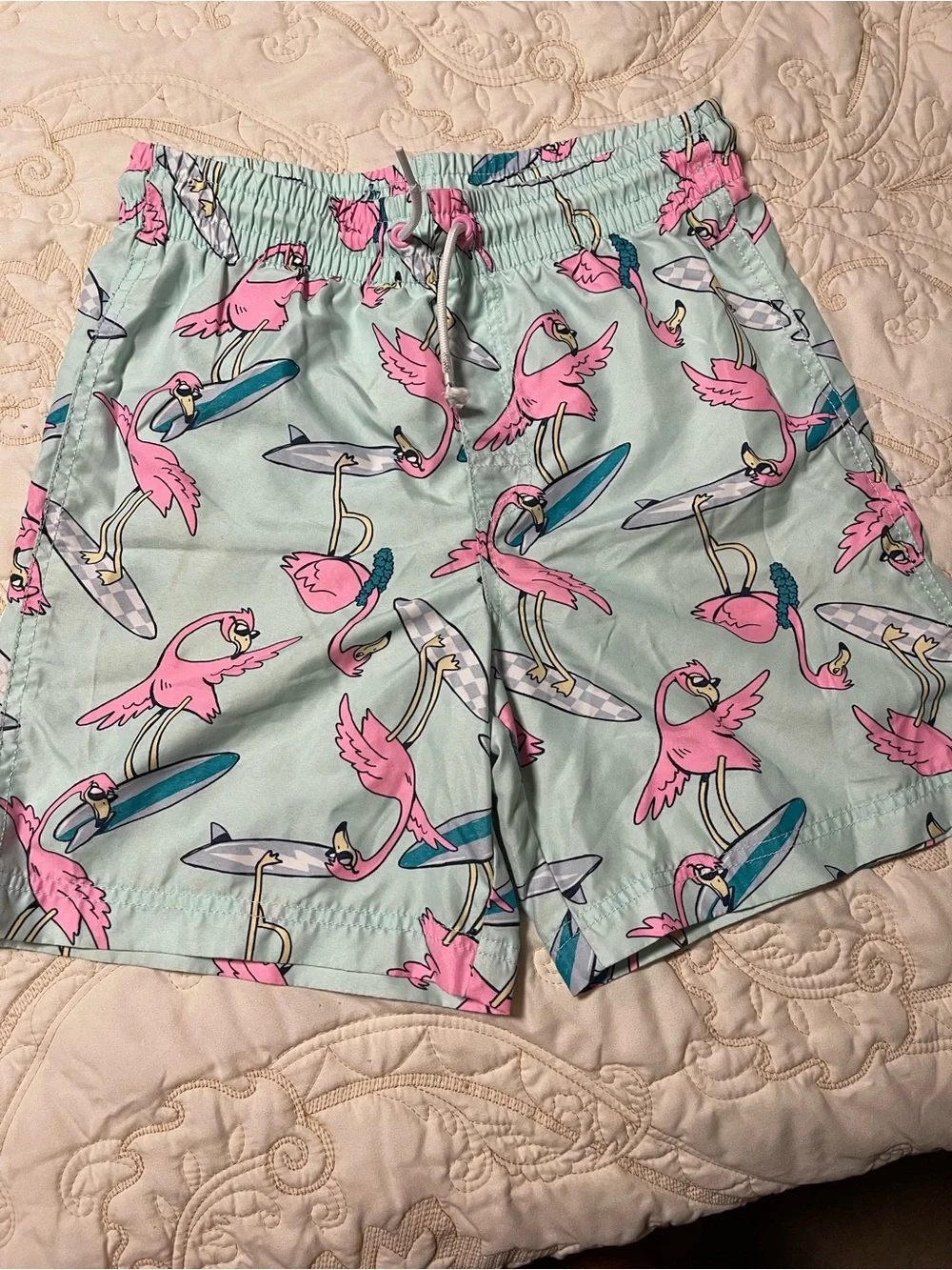 Old Navy Mint Green Swim Trunks with Pink Flamingo Print